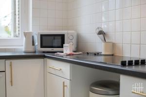 Appartements Le Wilson - Proche Centre Ville : photos des chambres