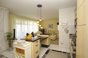 mit Meerblick und Balkon, gratis Nutzung vom AHOI Erlebnisbad und Sauna in Sellin - Panorama Göhren FeWo 11