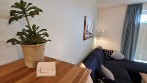 Cottage im Gutspark, Perlie - Komfort trifft maritimes Flair