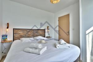 Appartements LocaLise - B02- Appartement vue mer - Plage et centre a pied - Balcon - Wifi inclus - Draps inclus - Animaux bienvenus : photos des chambres