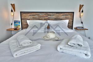 Appartements LocaLise - B02- Appartement vue mer - Plage et centre a pied - Balcon - Wifi inclus - Draps inclus - Animaux bienvenus : photos des chambres