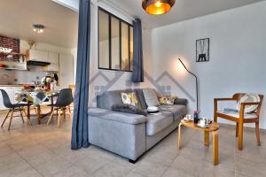 Appartements LocaLise - B02- Appartement vue mer - Plage et centre a pied - Balcon - Wifi inclus - Draps inclus - Animaux bienvenus : photos des chambres