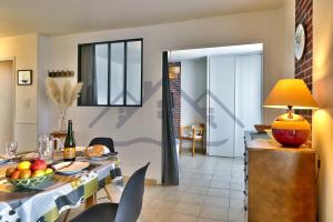 Appartements LocaLise - B02- Appartement vue mer - Plage et centre a pied - Balcon - Wifi inclus - Draps inclus - Animaux bienvenus : photos des chambres