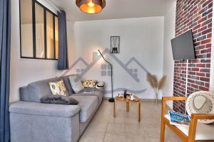 Appartements LocaLise - B02- Appartement vue mer - Plage et centre a pied - Balcon - Wifi inclus - Draps inclus - Animaux bienvenus : photos des chambres