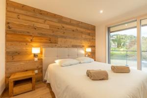 Villas Maison neuve- 5 minutes du lac : photos des chambres