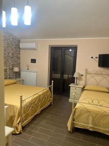 Chambre Triple avec Balcon