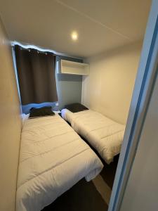 Campings Chez Flo Mobil-Home H13 : photos des chambres