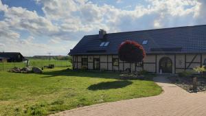 5 Sterne Ferienwohnung Dewichow mit Wasserblick & WLAN