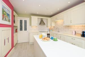 Beach Front House with Stunning Sea Views and Free Use of a Local Indoor Pool