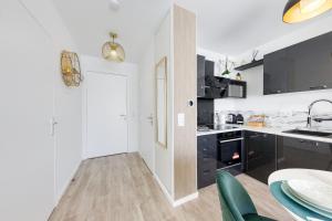 Appartements Cosy Melun 25 min Gare de Lyon : photos des chambres