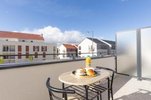 Appartements Cosy Melun 25 min Gare de Lyon : photos des chambres