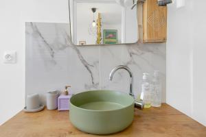 Appartements Jolie maisonnette paisible : photos des chambres