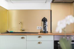 Appartements Jolie maisonnette paisible : photos des chambres