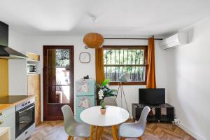 Appartements Jolie maisonnette paisible : photos des chambres