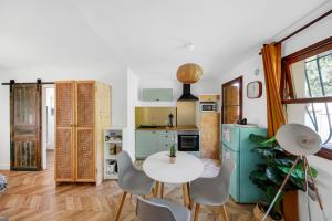 Appartements Jolie maisonnette paisible : photos des chambres