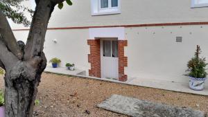 Appartements Studio independant avec jardin : photos des chambres