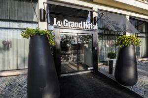 Hotels Le Grand Hotel : photos des chambres
