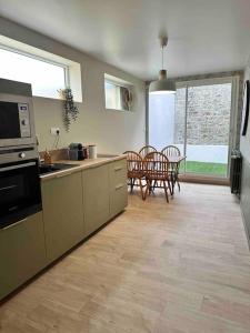 Maisons de vacances Petite maison de ville : photos des chambres