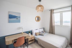 Appartements Evasion Urbaine - Chambre 2 - Hypercentre : photos des chambres