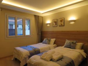 Chambre deux lits séparés