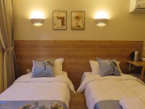 Chambre deux lits séparés