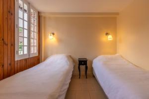 Maisons de vacances Domaine les Muids - Piscine et foret prives proche de Paris : photos des chambres