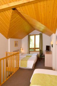 Hotels Le Bois Dormant-Hotel Restaurant & Spa Logis Hotel : Chambre Quadruple