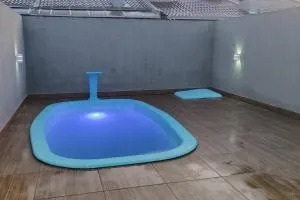 Casa com piscina praia de Leste - Balneário Praia do Leste