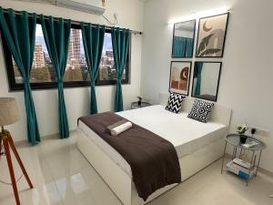 Skye Private 1Bhk in Amanora Park Town with WiFi AC Smart TV Washing Machine