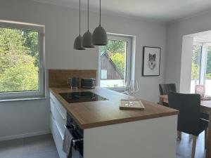 Ferienwohnung Waldesruh mit Kaminofen und Balkon