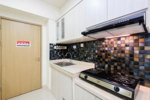 Brand New and Simple 2BR at Meikarta Apartment By Travelio