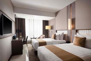 Phòng Hai Giường Đơn Loại Sang (Deluxe Twin Room)