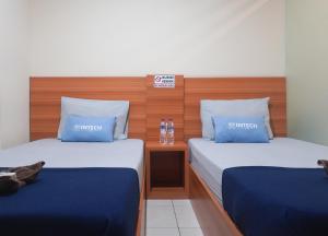 Phòng Hai Giường Đơn Loại Sang (Deluxe Twin Room)