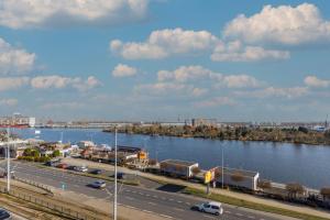 Stylish Apartment with River View and Desk for Remote Work in Szczecin by Noclegi Renters