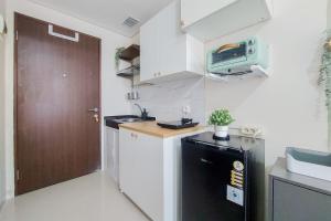 Simply and Cozy Living Studio Transpark Bintaro Apartment By Travelio