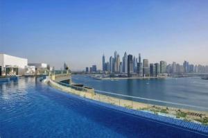 Beachfront Apartment on the Palm Jumeirah with Amazing view Rooftop Infinity Pool