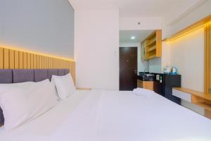 Serene Stay Studio Transpark Cibubur Apartment By Travelio