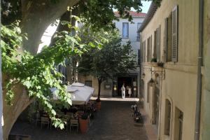 Appartements Studios entre le Pont d' Avignon et le Palais des Papes : photos des chambres