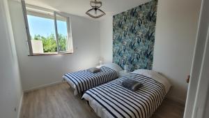 Appartements Le Marquis : photos des chambres