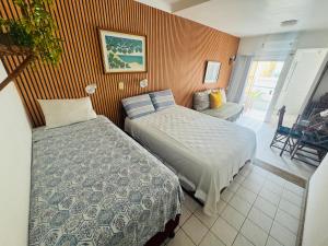 Flat encantador beira mar na Barra . Em frente a praia! No Circuito do Carnaval de Salvador!