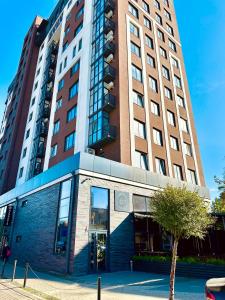 Modern apartments with a coffee machine in the city center, a view of the city