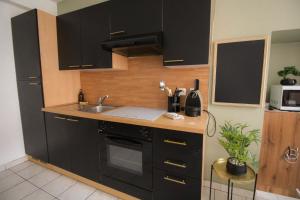 Appartements Le petit Monlogis - Calme - Wi-Fi : photos des chambres