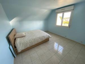 Villas Maison posee sur la plage : photos des chambres