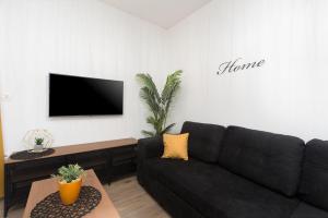 Strandnahes, modernes Apartment mit privater Terrasse, Grill - nur 250 Meter zum Strand