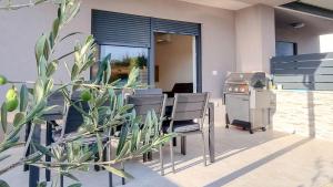 Top-modernes Ferienhaus unweit vom Strand mit Klima, WiFi, Grill 