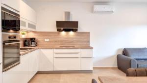 Top-modernes Ferienhaus unweit vom Strand mit Klima, WiFi, Grill 