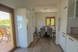 Cozy Ferienhaus mit Jacuzzi, Garten, Aussendusche, Grill 