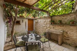 Strandnahes Apartment inmitten der Altstadt mit mediterranem Garten - nur 150 Meter zum Meer
