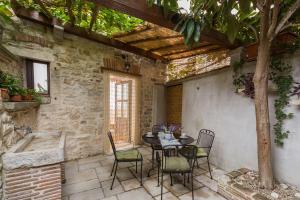 Strandnahes Apartment inmitten der Altstadt mit mediterranem Garten - nur 150 Meter zum Meer