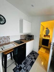 Appartements Studio lumineux : photos des chambres